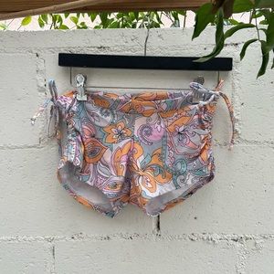 New without tags: Onzie Side String Short, One Size